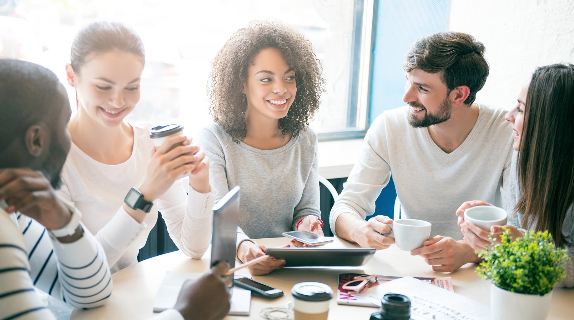 Young professionals networking in Portland urban setting