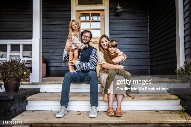 Utah family in front of their rural home purchased with USDA loan